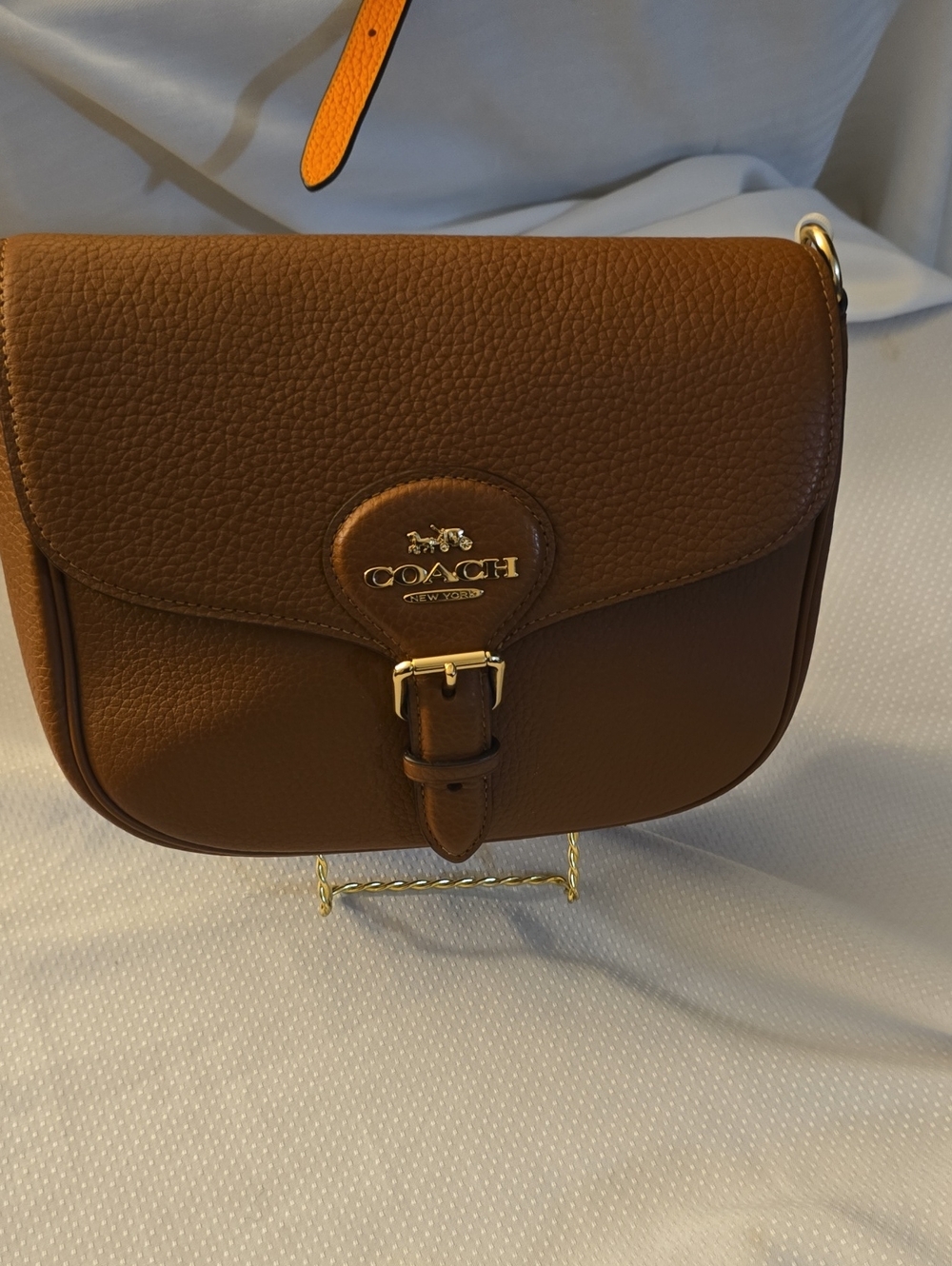 Coach Brown Pebbled Leather Crossbody Saddle Bag with Gold Hardware